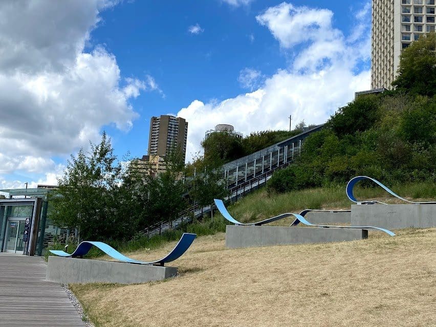 Artwork display along the walkway next to the funicular.