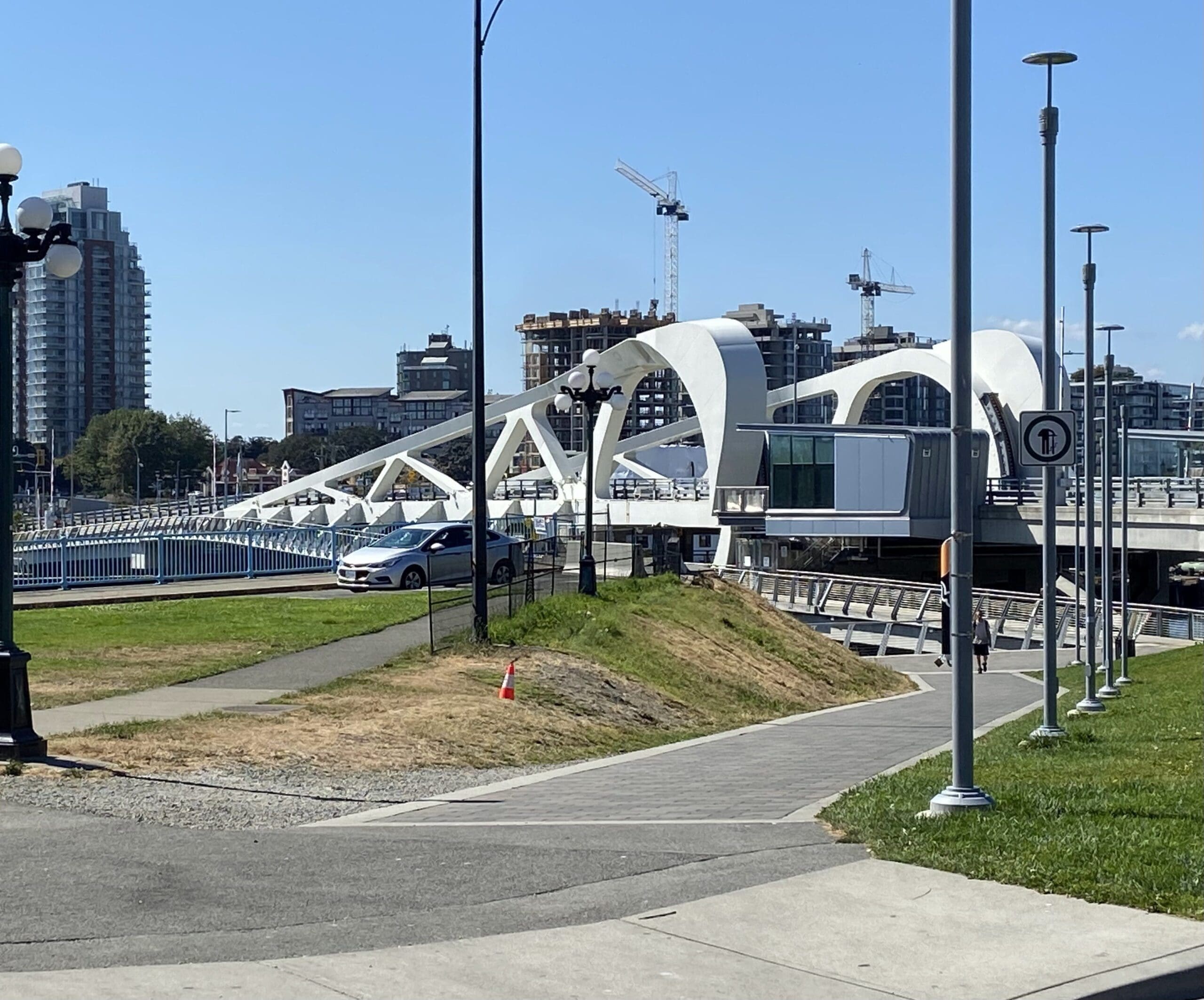 This is a view of the Johnson Street Bridge in Victoria BC.  Walking over the bridge is one of the best things to do in Victoria BC while out walking.